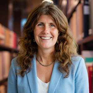 smiling woman with long dark hair
