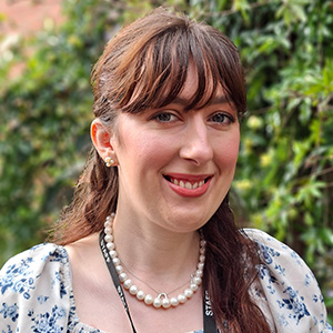 smiling woman with dark hair